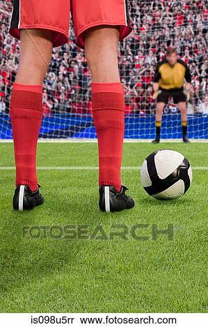 Goalkeeper anticipating free kick View Large Photo Image Stock Photography - Goalkeeper anticipating free kick. Fotosearch