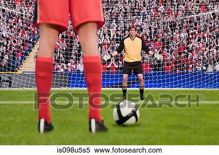 Goalkeeper anticipating free kick View Large Photo Image Stock Photography - Goalkeeper anticipating free kick. Fotosearch