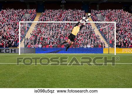 Stock Photo - Goalkeeper saving a goal. Fotosearch