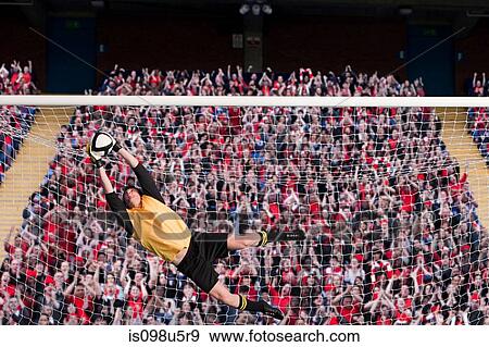 Goalkeeper saving a goal View Large Photo Image Stock Photo - Goalkeeper saving a goal. Fotosearch