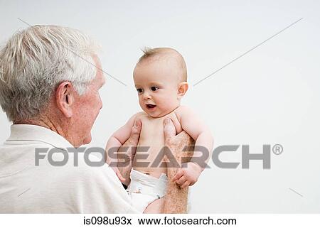 Grandfather with baby grandson View Large Photo Image Stock Photo - Grandfather with baby grandson. Fotosearch