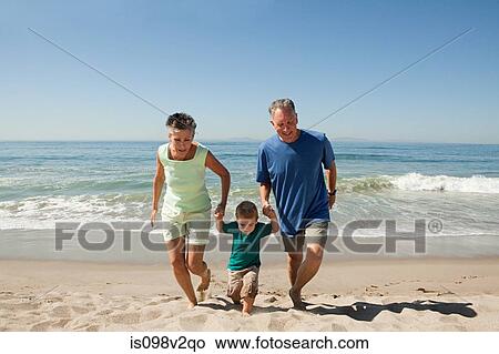 Grandparents with grandson on vacation View Large Photo Image Picture - Grandparents with grandson on vacation. Fotosearch