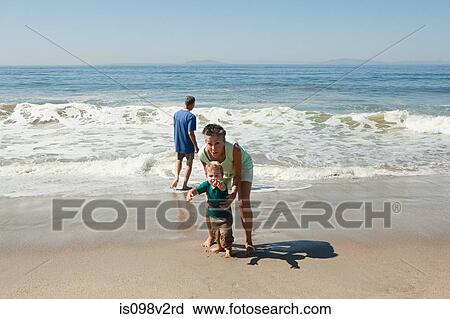 Grandparents with grandson on vacation View Large Photo Image Stock Image - Grandparents with grandson on vacation. Fotosearch