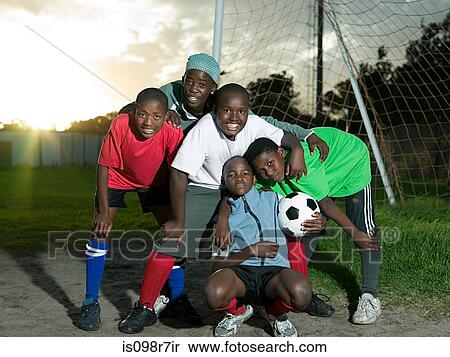 Group of teenage boys with football View Large Photo Image Stock Photography - Group of teenage boys with football. Fotosearch