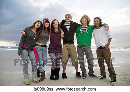 Stock Photograph - Group of young friends, portrait. Fotosearch