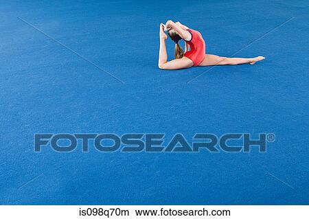 Gymnast doing the splits View Large Photo Image Picture - Gymnast doing the splits. Fotosearch