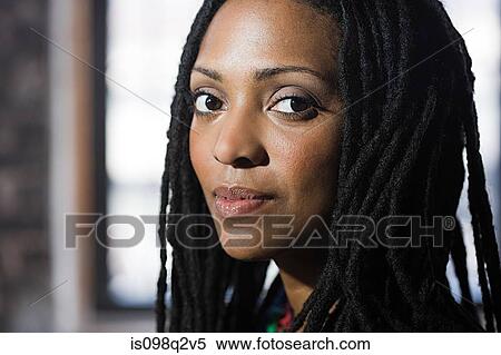 Stock Photography - Headshot of a young woman. Fotosearch