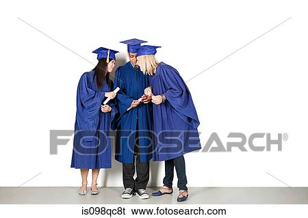 Stock Photograph - High school graduates. Fotosearch