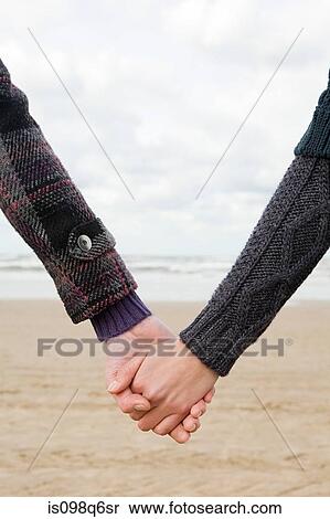 Holding hands View Large Photo Image Stock Photography - Holding hands. Fotosearch