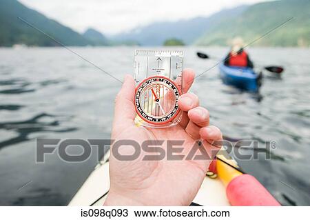 Kayaker with compass View Large Photo Image Stock Image - Kayaker with compass. Fotosearch