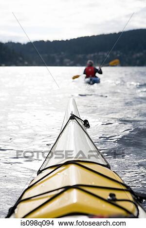 Kayaking in fjord View Large Photo Image Picture - Kayaking in fjord. Fotosearch
