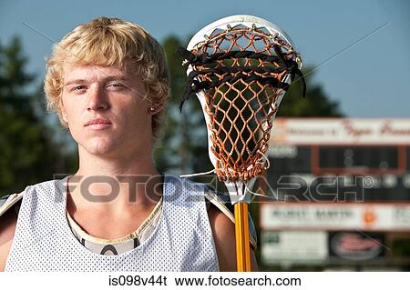 Lacrosse player with lacrosse stick View Large Photo Image Stock Photograph - Lacrosse player with lacrosse stick. Fotosearch