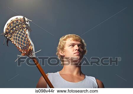 Stock Photography - Lacrosse player with lacrosse stick. Fotosearch