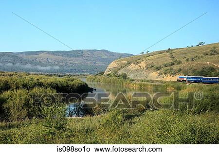 Landscape and trans-siberian express traveling towards mongolia View Large Photo Image Picture - Landscape and trans-siberian express traveling towards mongolia. Fotosearch