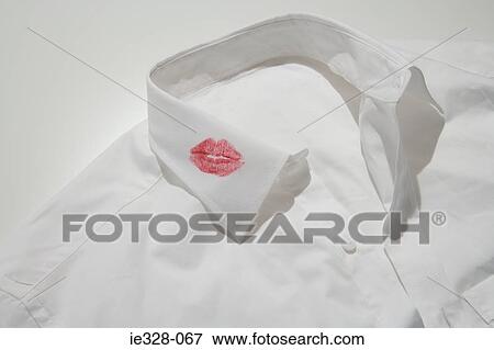 Lipstick kiss on a collar View Large Photo Image Stock Photo - Lipstick kiss on a collar. Fotosearch