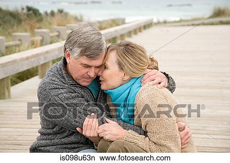 Picture - Loving couple at the coast. Fotosearch