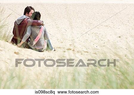 Loving couple on a beach View Large Photo Image Stock Photography - Loving couple on a beach. Fotosearch