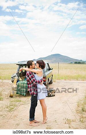 Loving couple on road trip View Large Photo Image Stock Photograph - Loving couple on road trip. Fotosearch