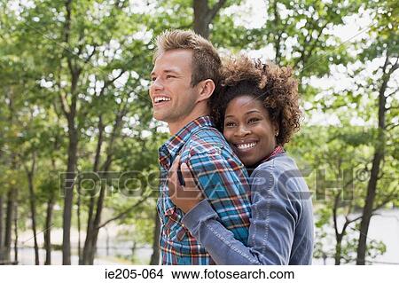 Picture - Loving couple outdoors. Fotosearch