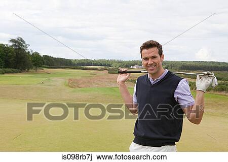 Male golfer on the fairway View Large Photo Image Stock Image - Male golfer on the fairway. Fotosearch