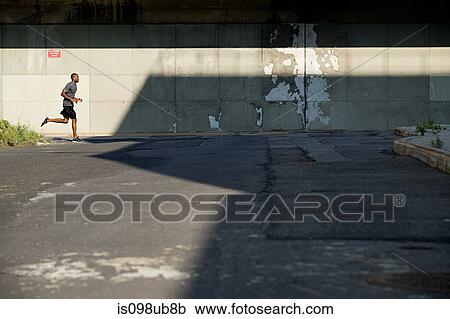 Male runner in brooklyn View Large Photo Image Stock Image - Male runner in brooklyn. Fotosearch