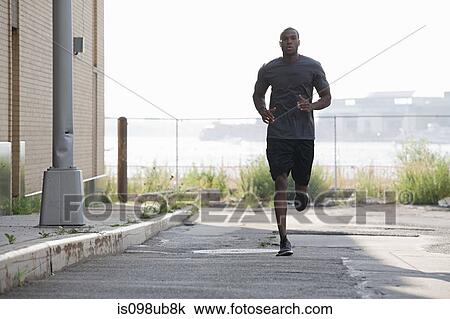 Male runner in brooklyn View Large Photo Image Stock Image - Male runner in brooklyn. Fotosearch