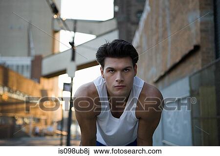 Male runner in urban setting View Large Photo Image Stock Image - Male runner in urban setting. Fotosearch
