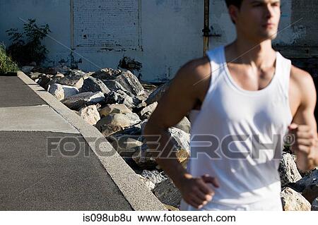 Stock Photograph - Male runner. Fotosearch