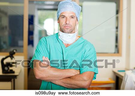 Male surgeon in scrubs View Large Photo Image Stock Photo - Male surgeon in scrubs. Fotosearch
