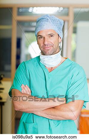 Male surgeon in scrubs View Large Photo Image Stock Photography - Male surgeon in scrubs. Fotosearch