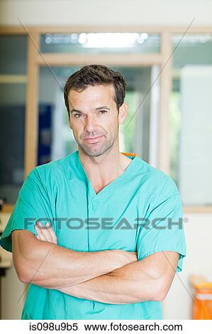 Stock Photography - Male surgeon in scrubs. Fotosearch