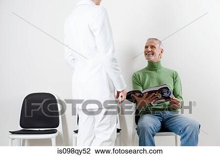 Man and dentist View Large Photo Image Stock Image - Man and dentist. Fotosearch