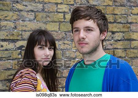Stock Photograph - Man and woman outdoors. Fotosearch
