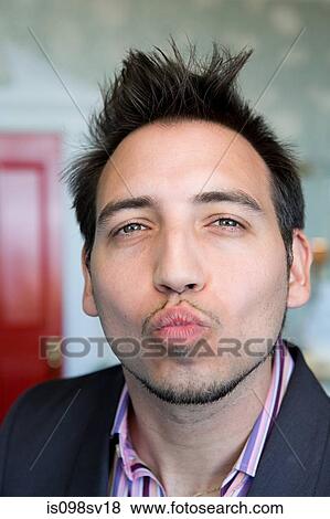 Man blowing a kiss View Large Photo Image Stock Photo - Man blowing a kiss. Fotosearch