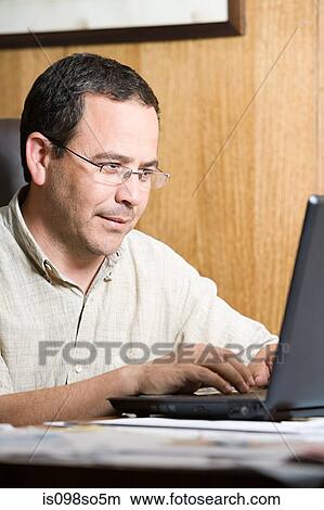 Picture - Man in office. Fotosearch