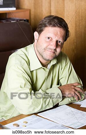 Stock Image - Man in office. Fotosearch