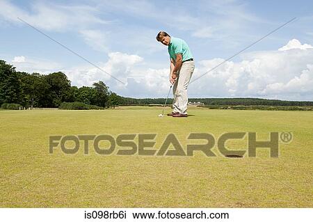 Man playing golf View Large Photo Image Stock Image - Man playing golf. Fotosearch