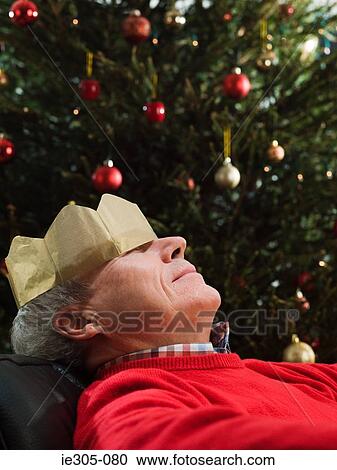 Man sleeping in an armchair View Large Photo Image Stock Image - Man sleeping in an armchair. Fotosearch