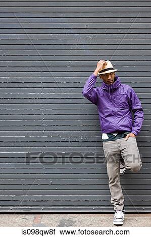 Man wearing fedora View Large Photo Image Stock Image - Man wearing fedora. Fotosearch