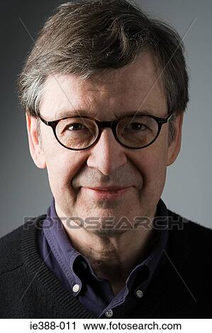 Stock Image - Man wearing glasses. Fotosearch