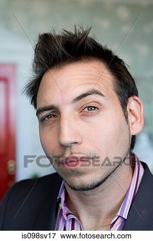 Man with raised eyebrow View Large Photo Image Stock Photo - Man with raised eyebrow. Fotosearch