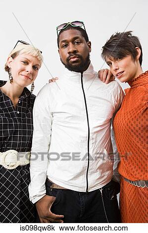 Stock Image - Man with two women. Fotosearch