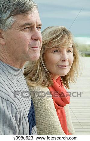Mature couple at the coast View Large Photo Image Stock Image - Mature couple at the coast. Fotosearch