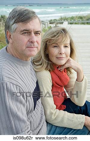 Mature couple at the coast View Large Photo Image Stock Photography - Mature couple at the coast. Fotosearch
