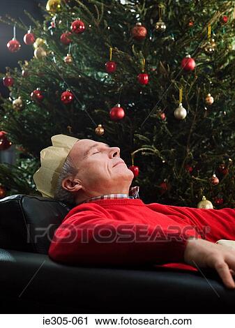 Mature man sleeping in chair View Large Photo Image Stock Image - Mature man sleeping in chair. Fotosearch