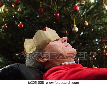 Mature man sleeping in chair View Large Photo Image Stock Photo - Mature man sleeping in chair. Fotosearch