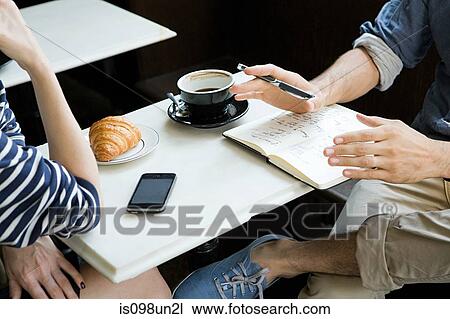 Meeting over coffee View Large Photo Image Stock Image - Meeting over coffee. Fotosearch