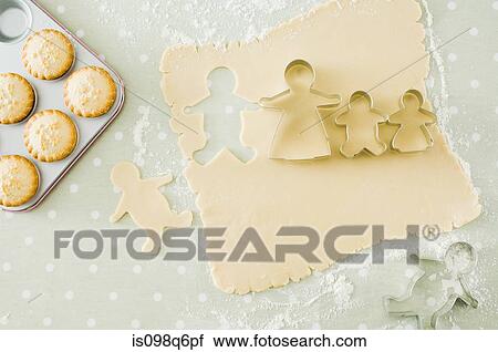 Mince pies and gingerbread men View Large Photo Image Stock Image - Mince pies and gingerbread men. Fotosearch