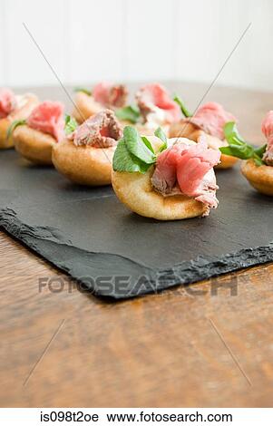 Miniature roast beef and yorkshire pudding canapes View Large Photo Image Stock Image - Miniature roast beef and yorkshire pudding canapes. Fotosearch