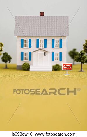 Stock Image - Model of house for sale. Fotosearch